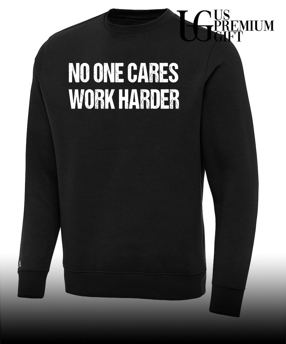 Bryson DeChambeau wearing No One Cares Work Harder shirt