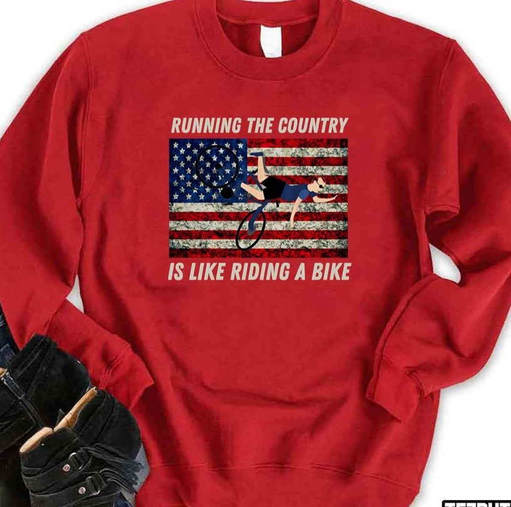 Biden Running The Country Is Like Riding A Bike Unisex T-Shirt