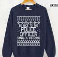 Be Nice To The Police Officer Santa Is Watching Ugly Christmas Unisex Sweatshirt