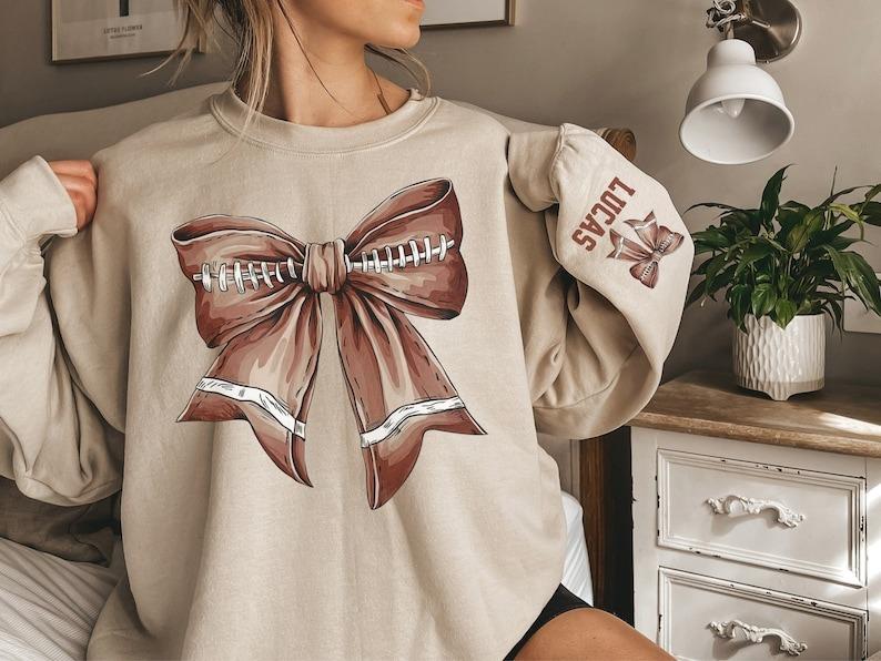 Football Bow Sweatshirt T shirt, Football Coquette Hoodie, Football Mom Shirt, Personalized Game Day Sweatshirt, Sleeve,  Football Mom  Sweatshirt, Fo