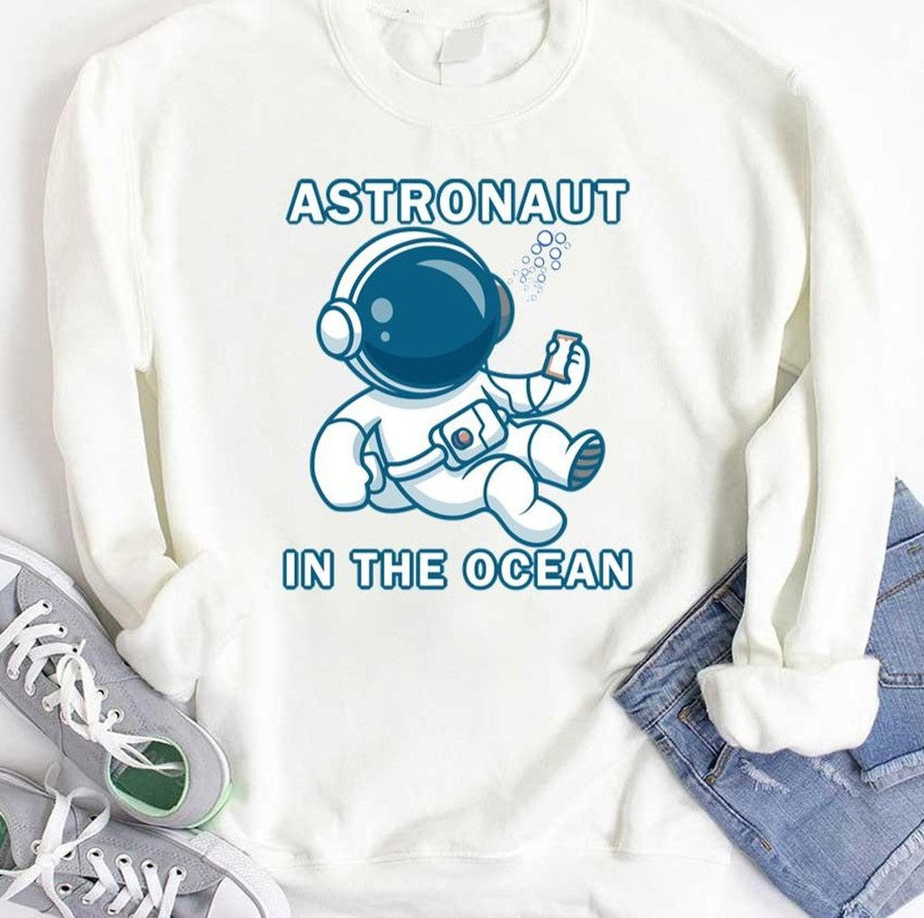 Astronaut In The Ocean Holding Phone In Deepwater Unisex T-Shirt