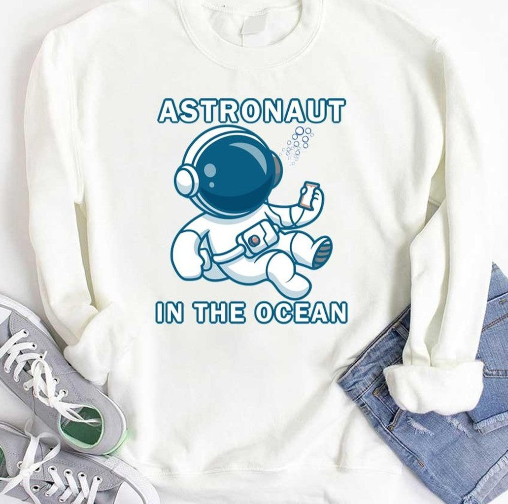Astronaut In The Ocean Holding Phone In Deepwater Unisex T-Shirt