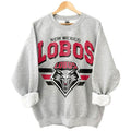 New Mexico Lobos Vintage NCAA Sweatshirt, University Football Shirt, Classic Gift for Fans, Men, Women, Unisex Cotton Comfort, Vintage Style