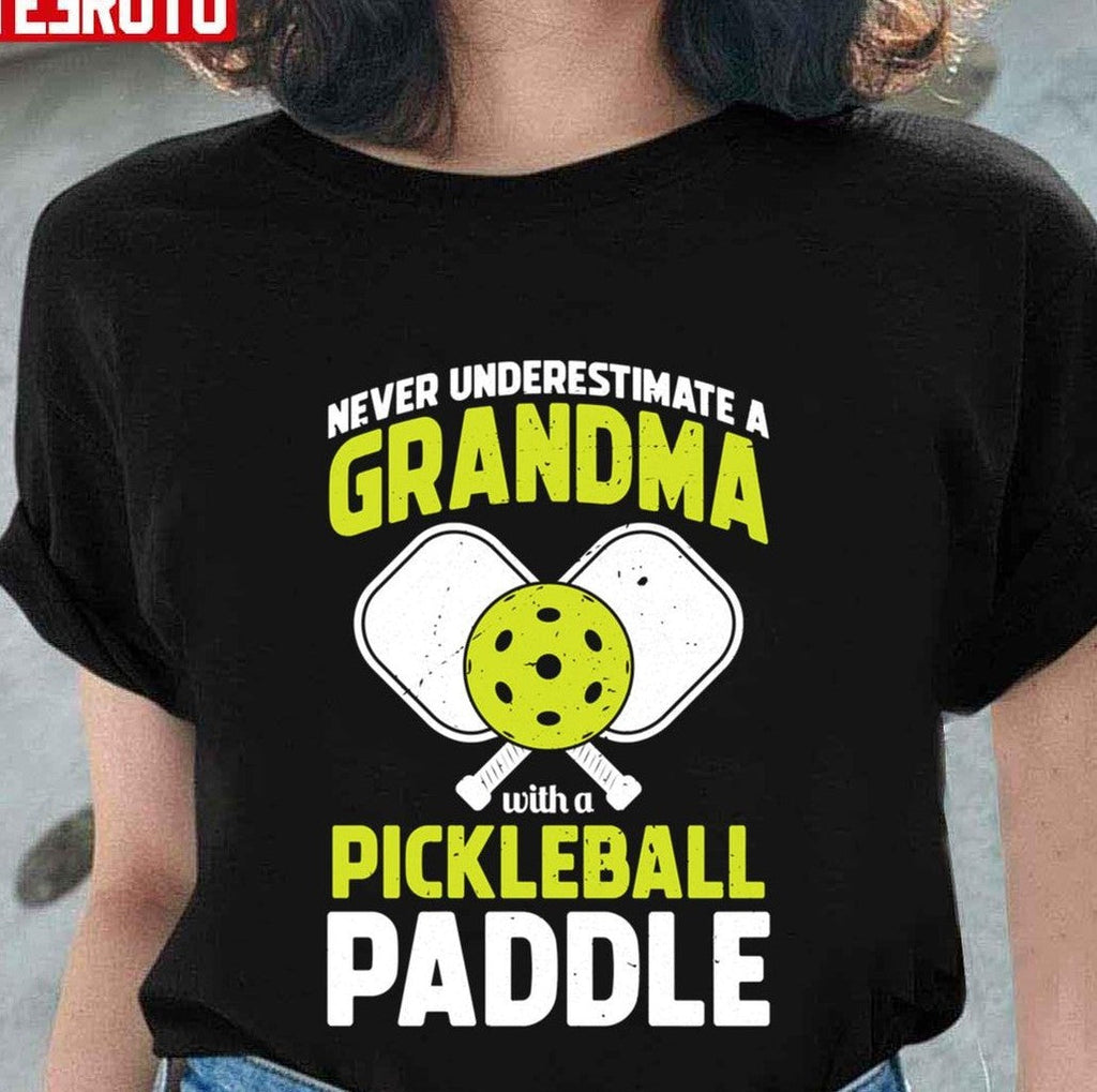 Never Underestimate A Grandma Funny Pickle Ball Player Gift Unisex T-shirt
