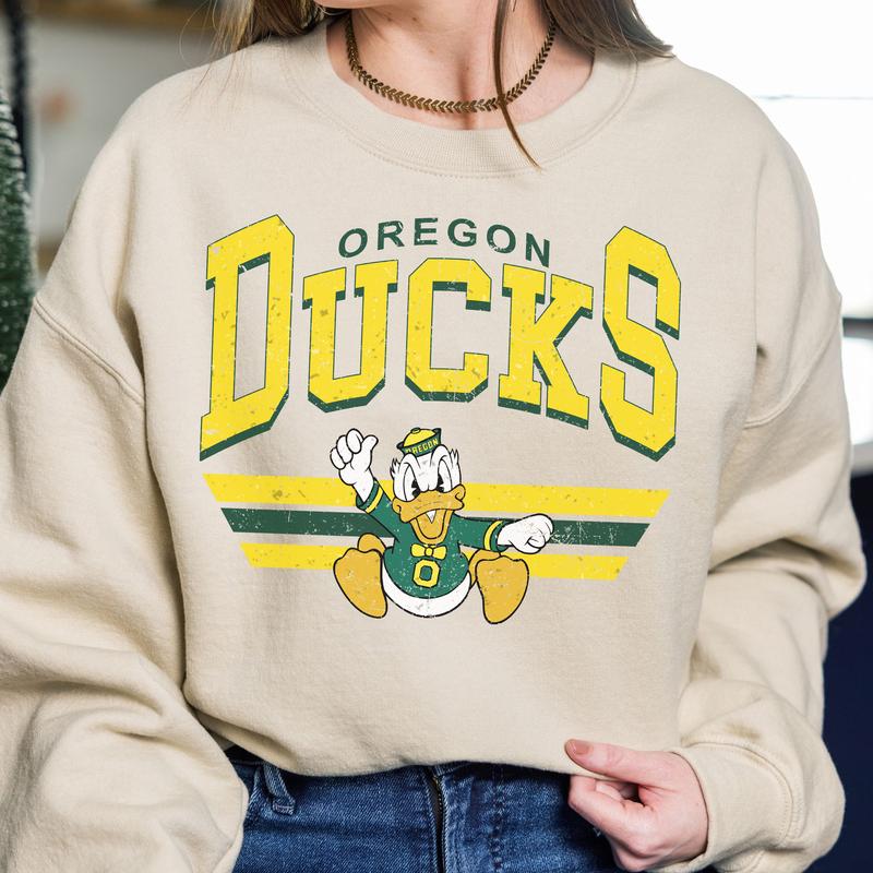 45. Oregon Ducks NCAA Vintage Sweatshirt, Classic Football Team Apparel, Sports Gift for Enthusiasts