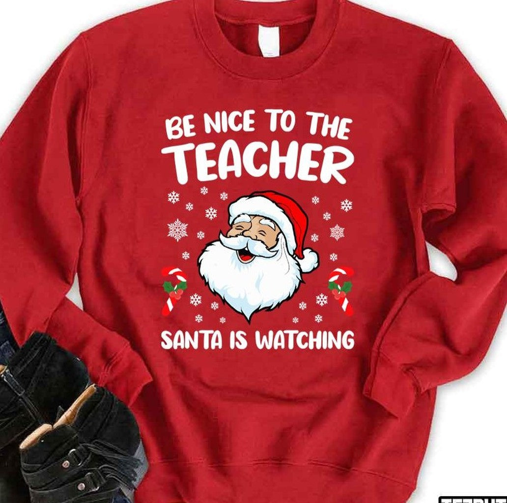 Be Nice To The Teacher Santa Is Watching Snowing XMas Unisex Sweatshirt