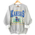 Kansas Jayhawks Vintage NCAA Sweatshirt, Unisex Jayhawks Football Shirt, Classic Sport Hoodie, Gifts for Football Fans, Cotton T-Shirt, Clothing