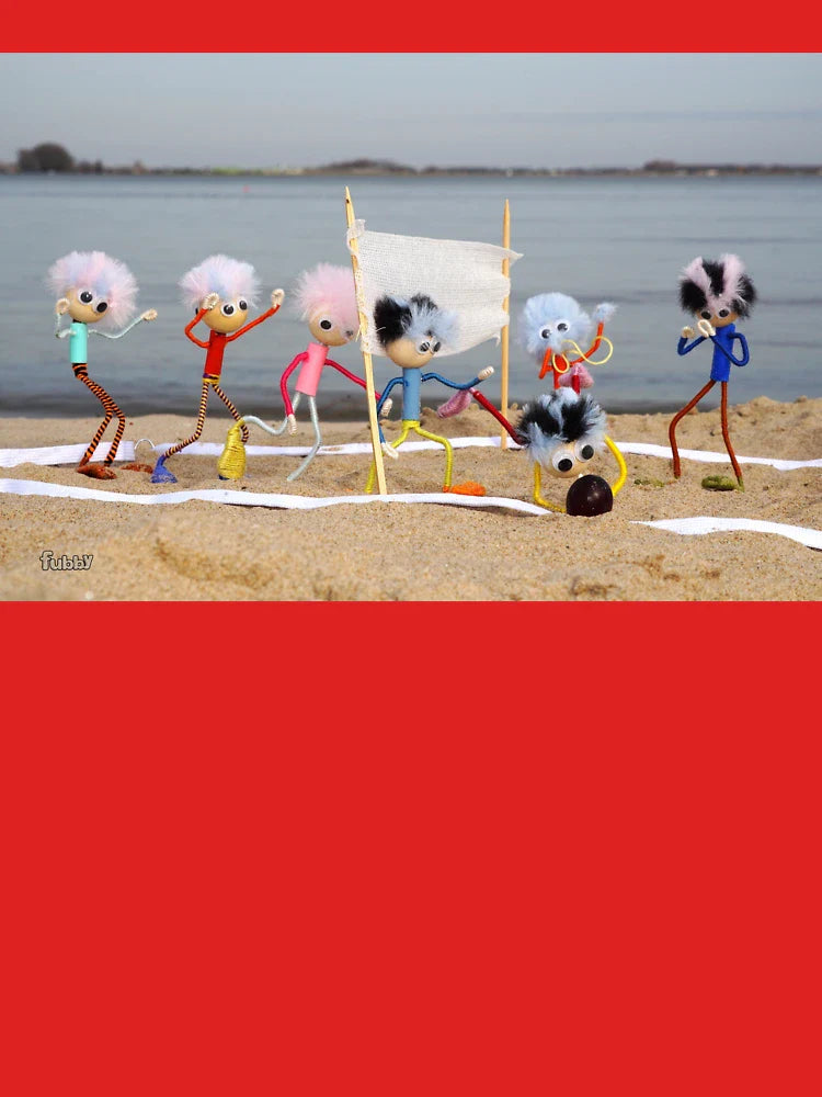 Fubby dolls playing beach volleyball on the beach. Classic T-Shirt