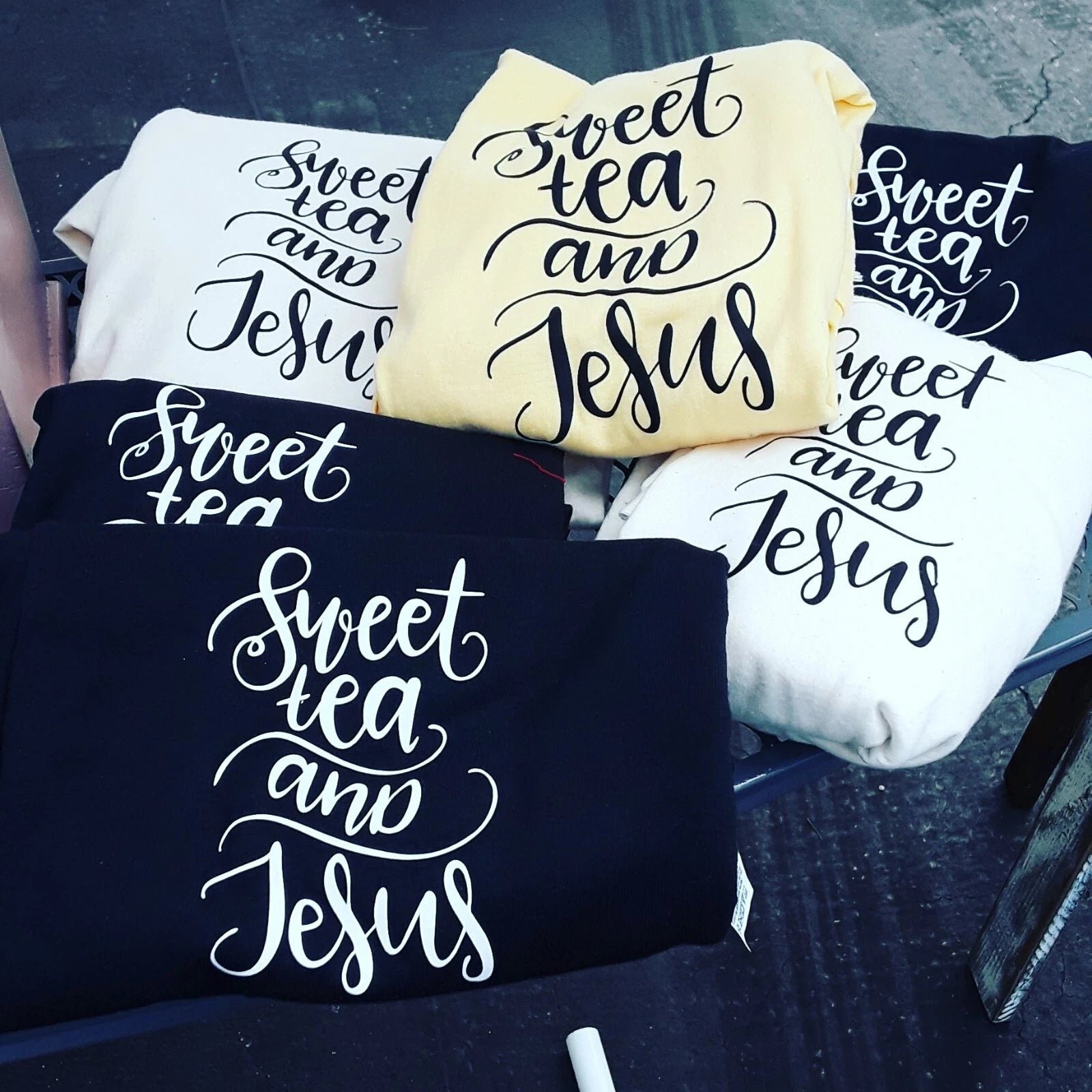 Handmade Vinyl Graphic Ts "Sweet Tea & Jesus" print in the middle of shirt.
